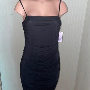 Long black dress made with at least 30% recycled polyester